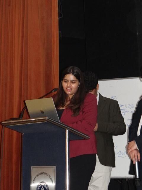 Speaking at the podium