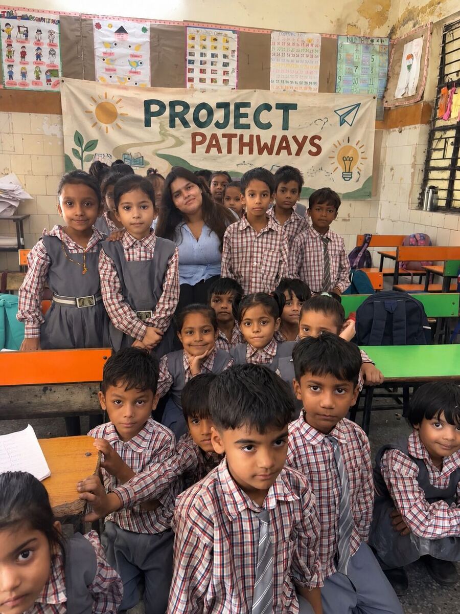 Project Pathways students with the banner