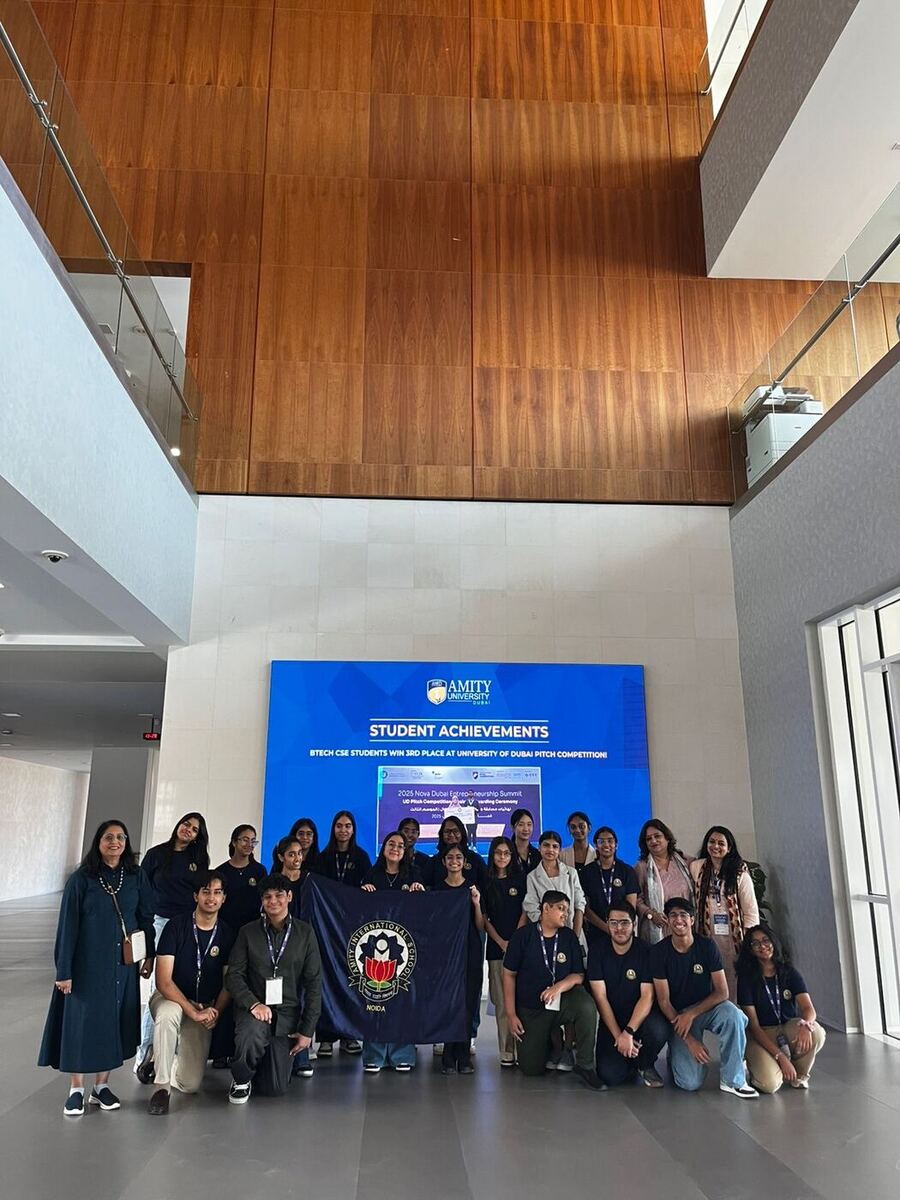 With the student delegation at a research summit