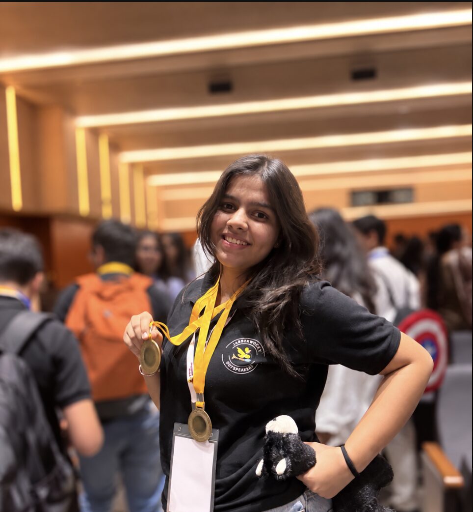 With my medals at the World Scholar's Cup